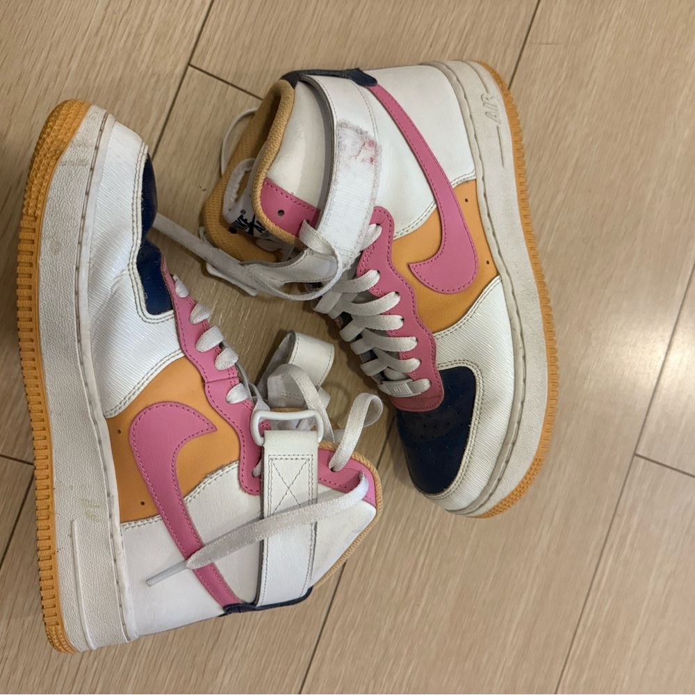Nike High-Top Sneakers with Pink and Orange Details